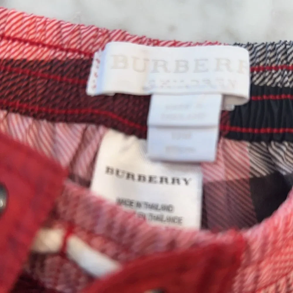 BURBERRY BOYS RED SWIM SHORTS 12M